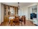 Dining room boasts wood floors, a hutch and an adjacent kitchen for entertaining at 16491 County Road 32, Platteville, CO 80651