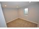 Bedroom with carpet, window, and neutral walls at 5585 W 51St Pl, Denver, CO 80212