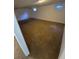 Large finished basement with recessed lighting and windows at 12063 E Arizona Dr, Aurora, CO 80012