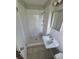 Cozy bathroom featuring a shower, vanity sink and tile flooring at 12063 E Arizona Dr, Aurora, CO 80012
