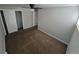 Spacious bedroom featuring plush carpeting and closet at 12063 E Arizona Dr, Aurora, CO 80012