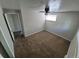Bedroom with plush carpeting, window and a ceiling fan at 12063 E Arizona Dr, Aurora, CO 80012