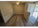 Dining area featuring new laminate flooring and lots of natural light at 12063 E Arizona Dr, Aurora, CO 80012