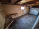 Spacious unfinished garage with built-in workbench at 12063 E Arizona Dr, Aurora, CO 80012