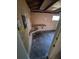 Unfinished garage with workbench area and lots of potential at 12063 E Arizona Dr, Aurora, CO 80012