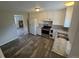 Modern kitchen with granite countertops, stainless steel appliances and plenty of cabinet space at 12063 E Arizona Dr, Aurora, CO 80012