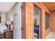 View into condo entryway features a peek into the bedroom at 805 Columbine Rd # 202, Breckenridge, CO 80424