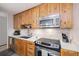 Close up of the kitchen with stainless steel appliances and light colored countertops at 805 Columbine Rd # 202, Breckenridge, CO 80424