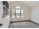 Bedroom with carpet flooring and lots of natural light from the window at 9618 W Chatfield Ave # B, Littleton, CO 80128