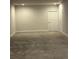 Spacious finished basement with neutral carpet, recessed lighting, and fresh paint at 226 S Shady Grove Ct, Aurora, CO 80018