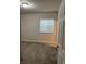 Bright bedroom with neutral tones, carpet flooring, and window with blinds at 226 S Shady Grove Ct, Aurora, CO 80018