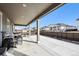 The outdoor covered patio, perfect for entertainment and relaxing in the backyard at 226 S Shady Grove Ct, Aurora, CO 80018