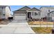 Charming single-Gathering home with a two-car garage and well-maintained front lawn at 226 S Shady Grove Ct, Aurora, CO 80018