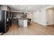 Spacious kitchen with center island, stainless steel appliances, and dark wood cabinetry at 226 S Shady Grove Ct, Aurora, CO 80018