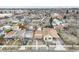 This aerial view shows compact neighborhood with a mix of housing styles and easy access to the city at 4764 High St, Denver, CO 80216