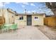 Private backyard featuring a patio and privacy fence, perfect for outdoor dining and entertaining at 4764 High St, Denver, CO 80216