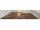 Close-up of bedroom flooring with light-colored wall at 4764 High St, Denver, CO 80216