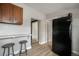 Charming kitchen with updated cabinets, and modern appliances, perfect for cooking and entertaining at 4764 High St, Denver, CO 80216