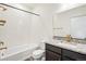 Modern bathroom with a soaking tub, sleek vanity, and modern finishes at 9274 Biscay St, Commerce City, CO 80022