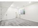 Neutral bedroom featuring soft gray carpet, bright natural light, and closet at 9274 Biscay St, Commerce City, CO 80022