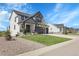 Beautiful two-story home with a spacious front yard and a well-maintained lawn at 1174 Williams Loop, Elizabeth, CO 80107