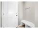 Functional mudroom features a bench and wall hooks for organization at 1174 Williams Loop, Elizabeth, CO 80107