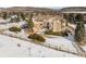 Aerial view of a luxurious home featuring a large yard and mountain views at 27 Tamarade Dr, Littleton, CO 80127