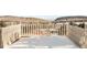 Balcony with mountain view, railing, and layer of winter snow at 27 Tamarade Dr, Littleton, CO 80127
