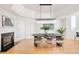Elegant dining room with modern chandelier and large windows at 27 Tamarade Dr, Littleton, CO 80127