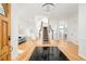 Grand foyer with hardwood floors, elegant staircase, chandelier and open layout at 27 Tamarade Dr, Littleton, CO 80127