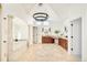 Spacious main bathroom features a vaulted ceiling, dual vanities, a soaking tub and natural stone accents at 27 Tamarade Dr, Littleton, CO 80127