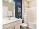 Bright bathroom with a tub, shower, and a modern vanity with a white countertop at 8395 E 132Nd Pl, Thornton, CO 80602
