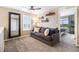 Comfortable living room with a cozy couch, neutral color palette, natural light, and stylish decor at 8395 E 132Nd Pl, Thornton, CO 80602