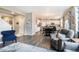 Open floor plan featuring the living room, dining area, and kitchen at 8395 E 132Nd Pl, Thornton, CO 80602