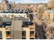 Stunning aerial view showcasing the building's rooftop deck and surrounding cityscape at 33 S Ogden St, Denver, CO 80209