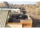 Overhead shot showing a beautiful rooftop deck with city skyline views at 33 S Ogden St, Denver, CO 80209