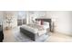 Bedroom featuring a plush bed, neutral decor, and a private balcony for relaxation at 33 S Ogden St, Denver, CO 80209