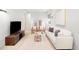 Comfortable living room with a TV, sofa, and cozy seating at 33 S Ogden St, Denver, CO 80209