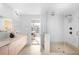 Beautiful bathroom with a glass shower, double sink vanity, and modern finishes at 33 S Ogden St, Denver, CO 80209