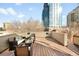 Private rooftop deck with comfortable seating, great for entertaining with city views at 33 S Ogden St, Denver, CO 80209