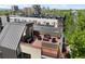 Cozy rooftop patio featuring comfortable seating, perfect for enjoying panoramic city views at 33 S Ogden St, Denver, CO 80209