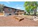 Expansive backyard featuring multiple decks, a garden and lovely landscaping; perfect for outdoor enjoyment at 2184 S Braun Way, Lakewood, CO 80228