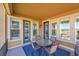 Cozy balcony with mountain views, perfect for outdoor dining and relaxation at 9351 Viaggio Way, Highlands Ranch, CO 80126