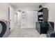 Bedroom with a spacious closet and easy access to other areas of the home at 9631 S Dover Way, Littleton, CO 80127