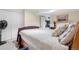 Well-appointed basement bedroom featuring a comfortable bed, closet, and decorative accents at 9631 S Dover Way, Littleton, CO 80127