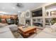 Cozy living room features a fireplace and built-in shelves, creating a welcoming space for relaxation at 9631 S Dover Way, Littleton, CO 80127