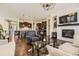 Spacious open-concept kitchen and living room featuring hardwood floors and modern decor at 14969 Elsinore Ave, Parker, CO 80134