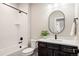 Clean bathroom with hexagon tile and a modern vanity at 1125 Brotherton Pt, Castle Rock, CO 80104