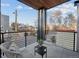 Relaxing balcony with seating and views of the neighborhood, perfect for enjoying fresh air and outdoor living at 2330 Eliot St # 2, Denver, CO 80211