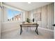 Bright home office with large windows, stylish desk, and accent wall at 2330 Eliot St # 2, Denver, CO 80211